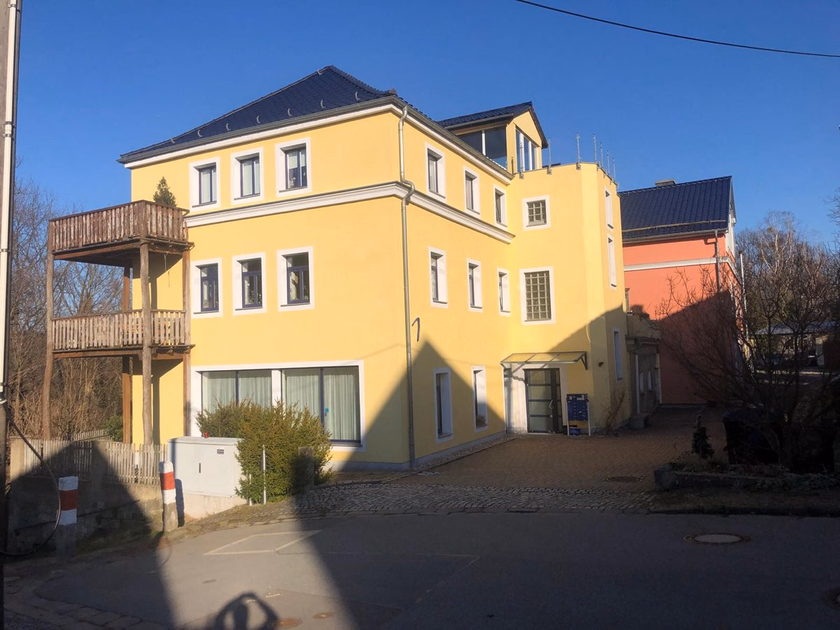 Wohnung 1: Symbolbild mit Sandstein- und Elbstimmung